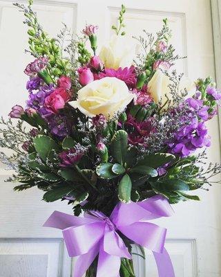 Beautiful arrangement with pink and white roses.