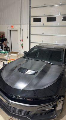 carbon fiber hood wrap on 21 Camaro