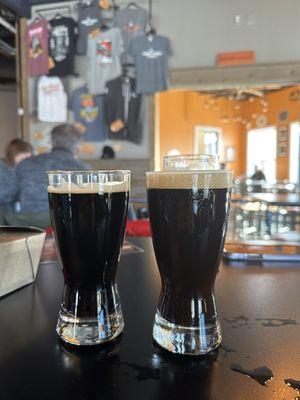 16 Hands stout on the left and Mailies milk stout nitro on the right, with a Riva's peaking in the back