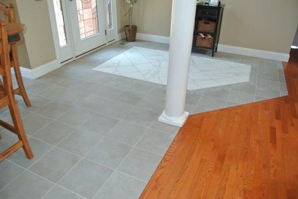 Tiled entry and tile rug to match the ceiling