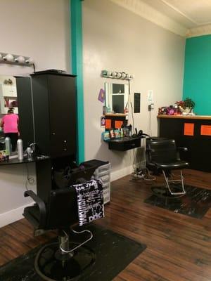 Salon Workstations and classic hair washing bays on the opposite wall