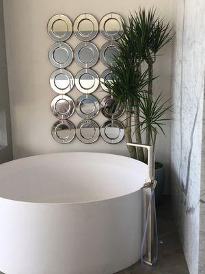 Master bathtub with marble slab surround. Private residence in Lido Isle, Newport Beach.