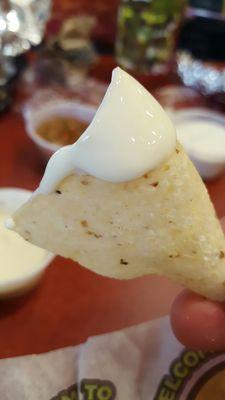 Bland queso on free chip.