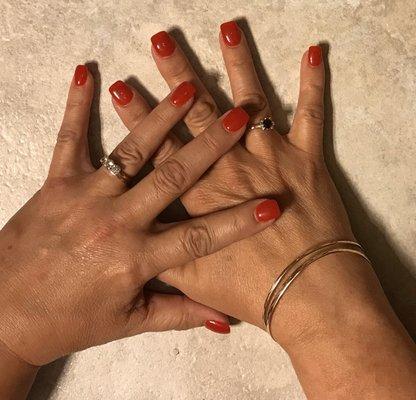 Love the shiny red nails!