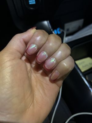 The horrible results of my nails that Design Nails did!! This is nothing like the photo! Horrible work and no time taken to fix the issue!