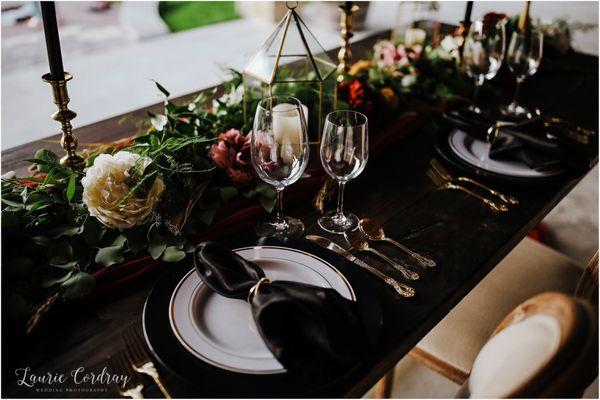 Table set ups all the way from the flowers down to the small gold accents. We got you boo.