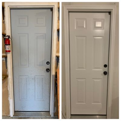 Rusted steel garage door. Sanded, primed and painted plus trim