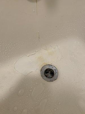 Paint peeling off with rust in tub