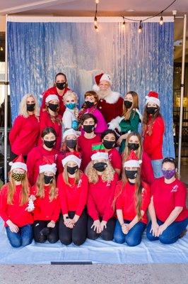 The Starlight Staff and interns grab a quick photo with Santa! (Photo credit: Nicole Dial Photography)