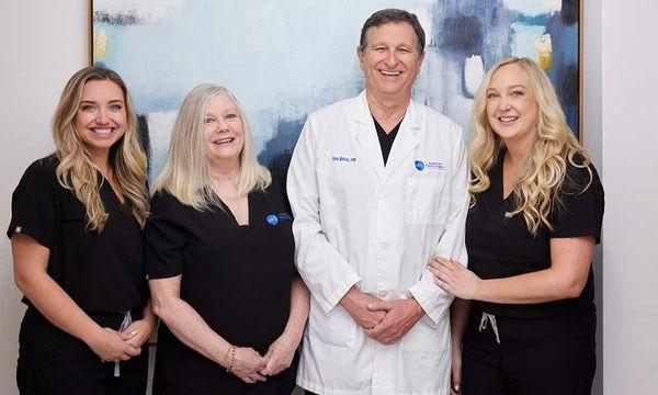 Dr. Kenneth S. White, MD, FCAS, with his team of cosmetic and plastic surgery nurses in Wilmington and Whiteville, North Caro...