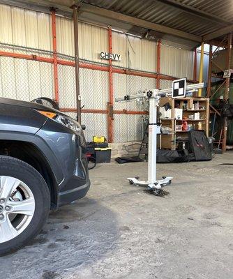 We offer both in shop & mobile service for recalibrations! This is a Nissan Rogue being recalibrated here at the shop.