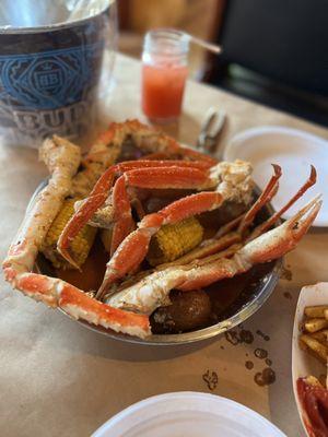 Yummmmy king crab and snow crab legs in garlic butter sauce