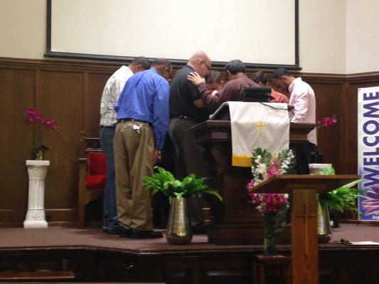 Partnership: Bethany Baptist Church leaders praying over Door of Hope Church leaders