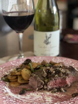 Filet mignon with mushroom sauce with a side of  potato and green beans. I used the wine to make the sauce.