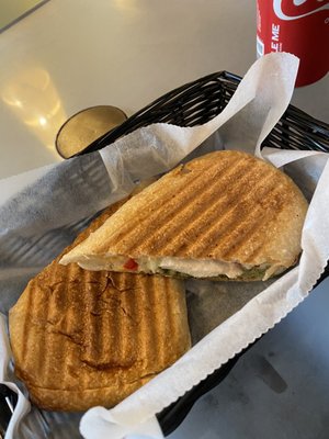 Chicken, provolone, red pepper, and pesto pressed sandwich