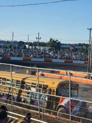 School bus driving around the track