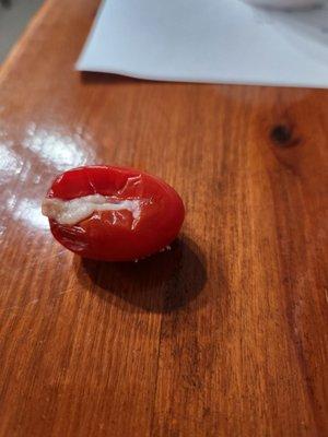 Molded tomato in salad.