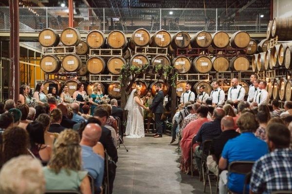 Wedding held in barrel room.