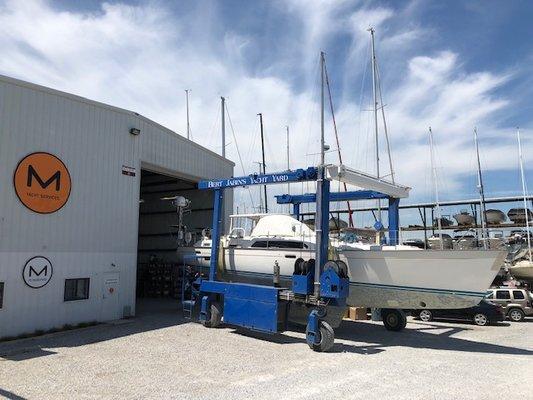 loading a 55 foot sailboat into our workshop