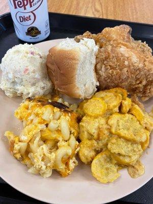 Fried chicken, potato salad, squash casserole, macaroni and roll. ALL amazing