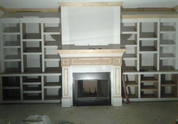 Single mantle with shelving.