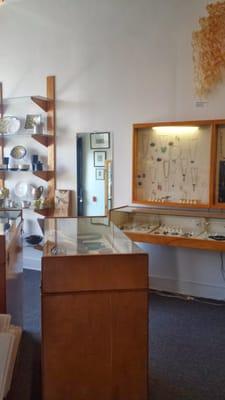 Interesting pottery pieces, unique jewelry items in massive wall cases, pricey finds..