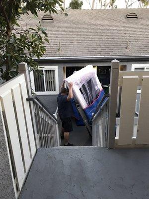 Eric moving my couch from 3rd floor apartment