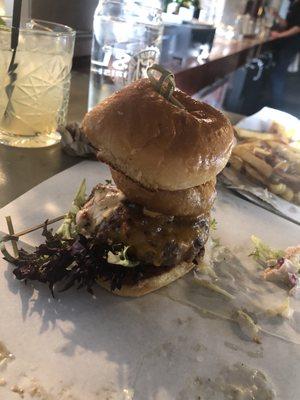 Bacon cheeseburger slider with onion ring from Back Country Gourmet, inside the restaurant. Delicious!