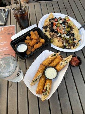 Spicy cheese curds, Nachos with Pulled Pork and Southwest Egg Rolls