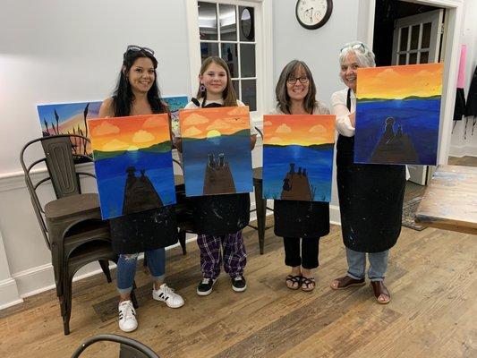 A happy group after their "Sunset Pets" Paint Night!