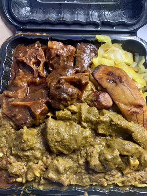 Curry goat and oxtail large combo with a side of rice and peas, cabbage and fried sweet plantains