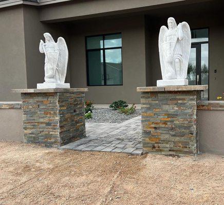 Final look of the front entrance of a home where the block wall and pavers were built and installed