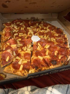 Pepperoni pineapple pizza