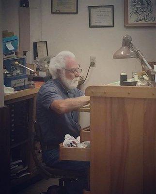 Bob working on watches at his bench.