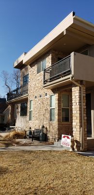 Duplex.  Before picture with white windows.