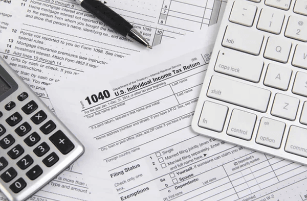 A close-up of a neatly filled 1040 income tax form, highlighting the detailed information required for an accurate return.