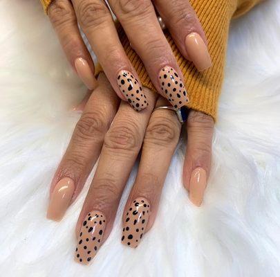 Acrylic cheetah print extensions.