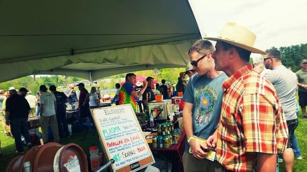 Sharon Package Store's craft beer aficionados check to see what's brewing at the Vermont Brewers Festival Brattleboro, VT.