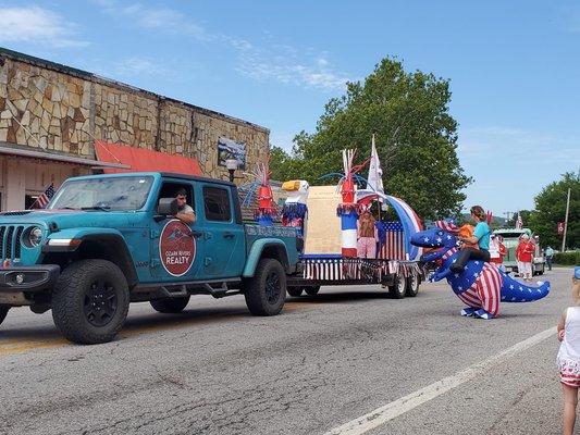 Taking part in the 4th of July parade.