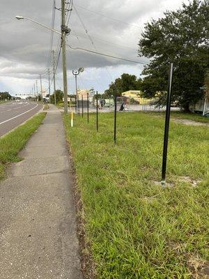 Commercial- Front Post Installation. Post installed 3ft into ground.