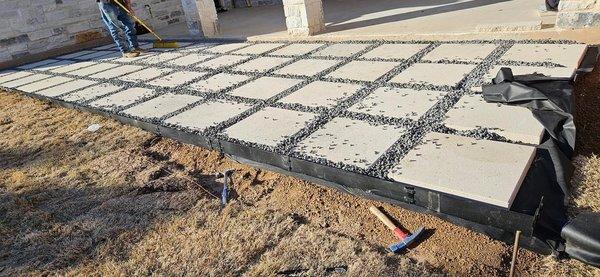 Backyard Patio pavers and black star gravel