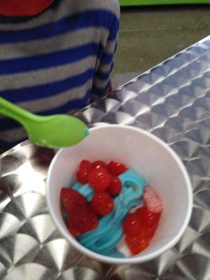 Cotton candy yogurt with cherries, boba, strawberries, and a sour patch kid. :)