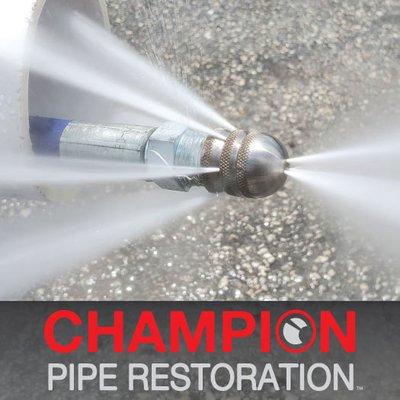 Champion Pipe Restoration hydro-jets and clears clogs in sewer pipes.