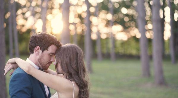 A couple dancing in the sunset.