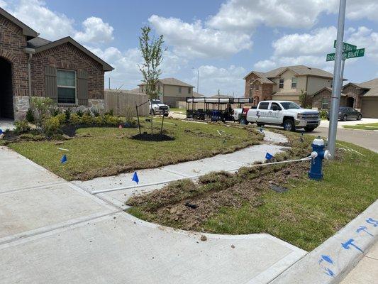 Sprinkler system installation during the process!