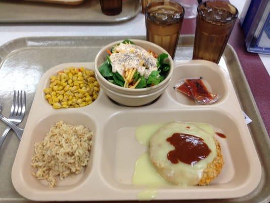 Pork cutlet, corn and salad for dinner.