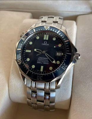 MINT Seamaster, with a supposedly "SCRATCHED" crystal. Total crooks, just want to up their "catch" metric.