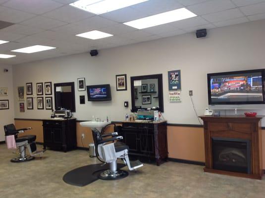 Two chair shop with Plasma TV for sports and a great place to hang out!