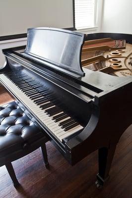 We have a regularly tuned baby Steinway for artists to use upon rental.