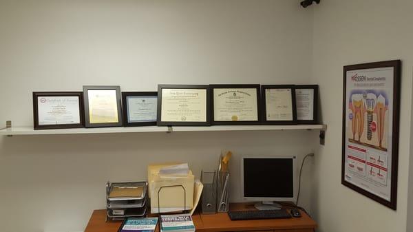 All the certificates the doctor has achieve throughout the years of study.